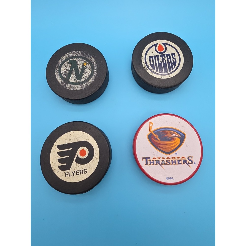 Set Of 4 Hockey Pucks NHL Vintage